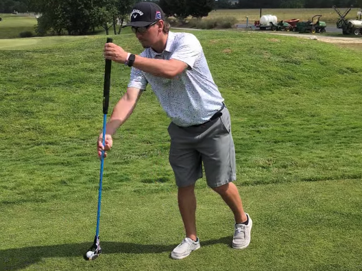 While they can use a traditional putting motion, FlingGolfers can also use their club to lightly toss the ball toward the pin. AARON MUSHRUSH PHOTO